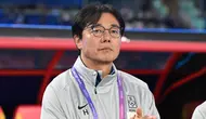 Hwang Sun-hong jadi pelatih sementara Timnas Korea Selatan. (Bola.com/Dok.AFP/Jung Yeon-je).