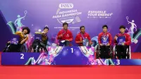 Pasangan Indonesia&nbsp;Supriadi/Agung Widodo (tengah) menjuarai kelas kursi roda&nbsp;nomor ganda putra WH 1 - WH 2 pada ajang Indonesia Para Badminton International 2022 di GOR Among Rogo, Yogyakarta, Sabtu, 27 Agustus. (foto: istimewa)