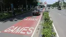 Mobil melintas di jalur khusus kontingen Asian Games 2018  di Jalan Benyamin Sueb, Kemayoran, Jakarta, Senin (30/4). Jalur khusus itu untuk memperlancar arus lalu lintas menyambut kontingen Asian Games pada Agustus mendatang. (Liputan6.com/Arya Manggala)