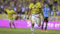 Colombia's defender Yerry Mina celebrates after scoring against Uruguay during their Russia 2018 World Cup qualifier football match in Barranquilla, Colombia, on October 11, 2016.  Raul Arboleda / AFP