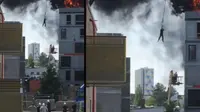 Korban terjebak kebakaran diselamatkan menggunakan crane. (Screen Grab)