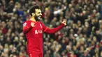 Pemain Liverpool Mohamed Salah melakukan selebrasi usai mencetak gol gawang Manchester United pada pertandingan sepak bola Liga Inggris di Stadion Anfield, Liverpool, Inggris, 19 April 2022. Liverpool menang 4-0. (AP Photo/Jon Super)