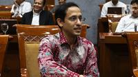 Menteri Pendidikan dan Kebudayaan Nadiem Makarim saat rapat dengan Komisi X DPR di Kompleks Parlemen, Senayan, Jakarta, Kamis (12/12/2019). Rapat membahas penghapusan Ujian Nasional (UN) pada 2021 dan sistem zonasi. (Liputan6.com/Johan Tallo)