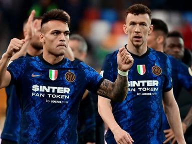 Inter Milan harus kerja keras saat mengalahkan Udinese dengan skor 2-1. Dua gol pasukan Simone Inzaghi dicetak oleh Ivan Perisic dan Lautaro Martinez. (AFP/Miguel Medina)
