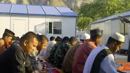 Citizen6, Haiti: Kegiatan Idul Adha 1432 H tetap dilaksanakan. Prajurit di Port Au Prince melaksanakan shalat Idul Adha berjamaah dengan imam dan khatib  Kapten Czi Saepudin. (Pengirim: Badarudin Bakri)