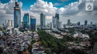 Foto udara suasana gedung bertingkat di kawasan Sudirman, Jakarta, Rabu (8/4/2020). Jakarta sempat menjadi kota paling berpolusi di dunia pada 29 September 2019 lalu, namun Rabu (8/4) siang ini, kualitas udara kota Jakarta membaik. (Liputan6.com/Faizal Fanani)