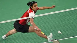 Bermain tiga set, tunggal putri Indonesia, Gregoria Mariska Tunjung harus mengakui keunggulan An Se Young (Korea Selatan) 1-2 (21-11, 13-21, dan 16-21). (ARUN SANKAR/AFP)