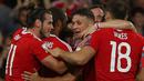 Gareth Bale dan para pemain Wales merayakan gol yang dicetak Joe Allen saat melawan Moldova pada kualifikasi Piala Dunia 2018 di Stadion Cardiff City Stadium, Cardif, Wales Selatan, (6/9/2016) dini hari WIB. (AFP/Geoff Caddick)