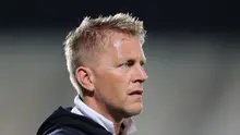 Heimir Hallgrimsson menjadi sosok di balik kesuksesan Timnas Islandia lolos ke putaran final Piala Dunia 2018. (KARIM JAAFAR / AFP)