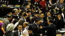 Sejumlah anggota MPR dari Koalisi Merah Putih merayakan kemenangan Paket Pimpinan MPR yang mereka ajukan dalam Sidang Paripurna MPR, Jakarta, (8/10/14). (Liputan6.com/Andrian M Tunay) 