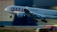 Ilustrasi penerbangan Qatar Airways. (AP)