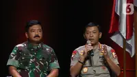 Kapolri Jenderal Pol Idham Aziz (kanan) memberikan paparan dalam diskusi panel VIII Rakornas Indonesia Maju antara Pemerintah Pusat dan Forum Koordinasi Pimpinan Daerah (Forkopimda) di Bogor, Jawa Barat, Rabu (13/11/2019). Panel VIII membahas stabilitas keamanan negara. (Liputan6.com/HermanZakharia)