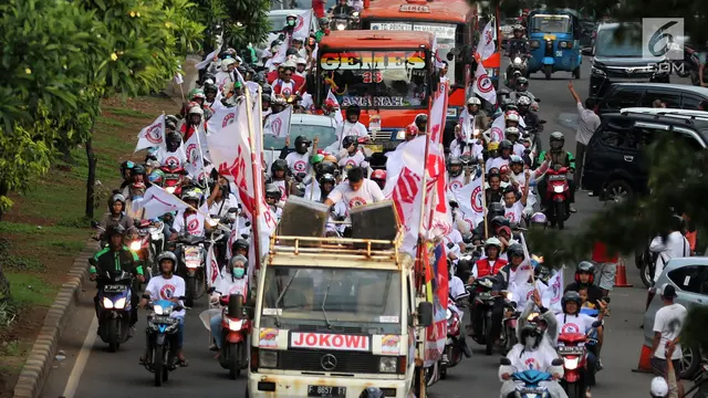 Konvoi Pendukung Jokowi Menuju Lokasi Debat Capres