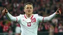 Alih-alih menyamakan kedudukan, Swedia malah kembali kebobolan. Kali ini lewat Piotr Zielinski yang berhasil melepaskan tembakan dari tengah kotak penalti pada menit ke-72. (AFP/Janek Skarzynski)