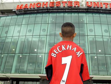 Angka tujuh merupakan nomor punggung kramat bagi klub Manchester United, karena banyak icon klub yang memakai nomor itu. Berikut 5 pemain bernomor punggung tujuh terbaik di Setan Merah. (AFP/Paul Barker)