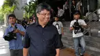 Dirut PT Assa Nusa Indonesia Paul Nelwan keluar dari gedung KPK usai menjalani pemeriksaan, Jakarta, (30/9/14). (Liputan6.com/Miftahul Hayat)