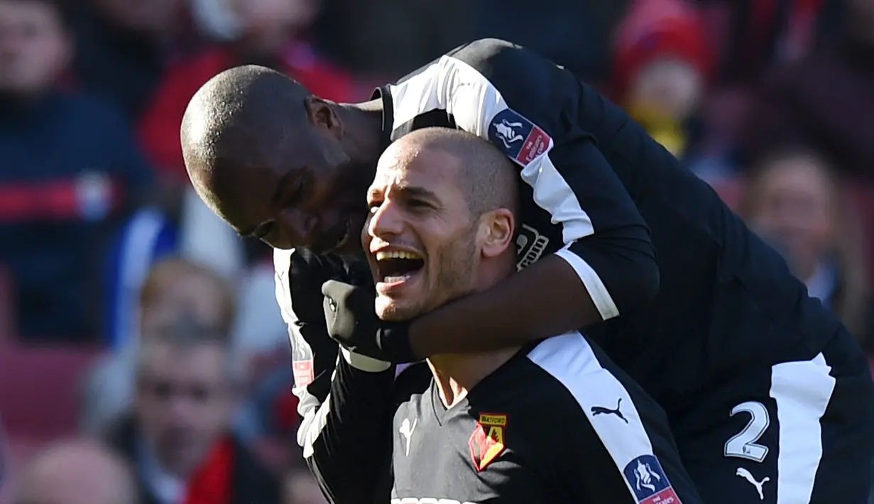 Pemain Watford, Adlène Guédioura, merayakan gol yang dicetaknya ke gawang Arsenal pada putaran keenam Piala FA di Stadion Emirates, London, Minggu (13/3/2016). (Action Images via Reuters/Tony O'Brien)