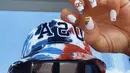 Atlet kano Tim USA Nevin Harrison menggunakan nail art lambang Olimpiade dan dan bendera asalnya, Amerika saat berkompetisi di Tokyo. Dok. Instagram Nevin Harrison