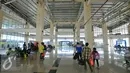 Para penumpang menunggu keberangkatan di terminal terpadu Pulo Gebang, Jakarta, Selasa (27/12). Perbaikan fasilitas di Terminal Pulogebang, Jakarta Timur hingga kini sudah mencapai 90 persen. (Liputan6.com/Angga Yuniar)