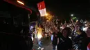 Sejumlah suporter Bali United turun ke jalan untuk merayakan keberhasilan tim kesayangannya menjuarai BRI Liga 1 2021/2022 di Bali, Sabtu (26/3/2022) dini hari. Skuat Serdadu Tridatu berhasil mencatatkan Back to Back usai berhasil mempertahankan juara pada 2019 lalu. (Bola.com/M Iqbal Ichsan)