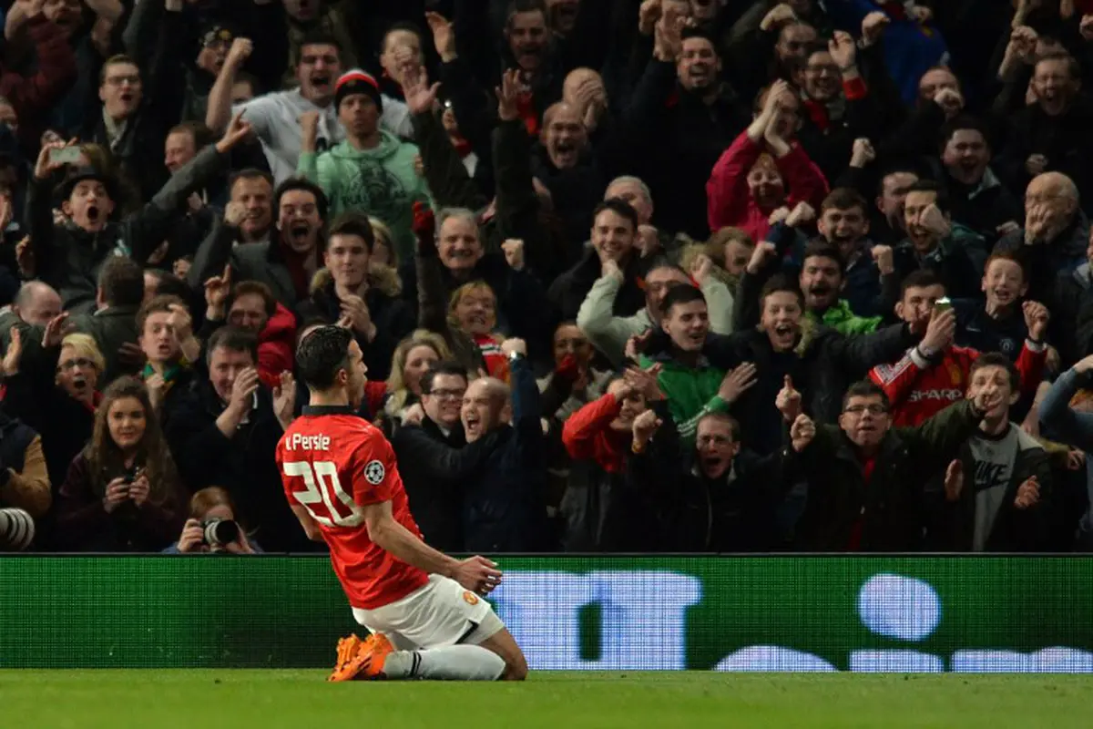 Selebrasi Gol Robin van Persie (PAUL ELLIS / AFP)