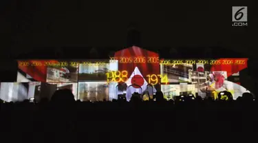 Projection mapping yang menggambarkan perjalanan hubungan diplomatik Indonesia-Jepang di Museum Fatahillah, Jumat (19/1). Pertunjukan ini menandai perayaan 60 tahun hubungan diplomatik Indonesia-Jepang. (Liputan6.com/Helmi Fithriansyah)