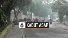 Kabut asap yang terjadi di Palembang, Sumatera Selatan semakin tebal. Sebagian sekolah melarang siswanya berkegiatan di luar ruangan karena takut terpapar penyakit akibat asap.