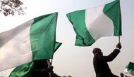 Bendera Nigeria (AFP Photo / Sodiq Adelakuin)