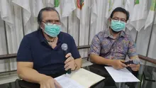 Presiden NPC Indonesia Senny Marbun (kiri) didampingi Wasekjen NPC, Rima Ferdiyanto dalam konferensi pers di Kantor pusat NPC Indonesia, Solo, Rabu (18/3/2020). (Bola.com/Vincentius Atmaja)