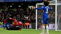 Penyerang Liverpool asal Belanda #18, Cody Gakpo, mencetak gol pertama timnya dalam pertandingan Liga Primer Inggris antara Chelsea dan Liverpool di Stamford Bridge, London, pada 4 Oktober 2025. (Glyn KIRK/AFP)
