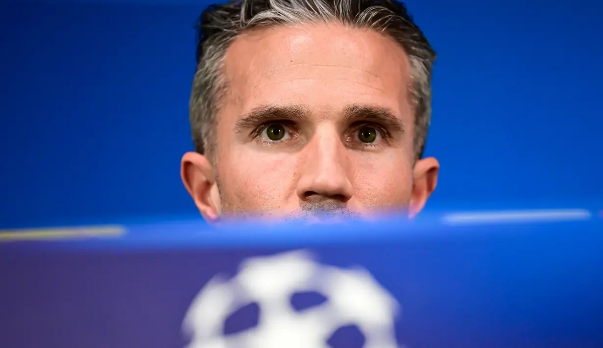 Pelatih baru Feyenoord Robin van Persie optimis dengan berjuang keras anak asuhnya bisa membuat kejutan saat bertandang ke markas Inter Milan pada leg kedua 16 besar Liga Champions, Rabu (12/3/2025). (AFP/Piero Cruciatti)