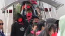 Sebelum diterbangkan ke Indonesia, ratusan WNI tersebut diseberangkan dahulu ke Thailand. (Tatan SYUFLANA/POOL/AFP)