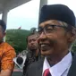 Mantan Hakim Agung Artidjo Alkostar tiba di Istana Kepresidenan, Jumat (20/12/2019). (Lizsa Egeham)