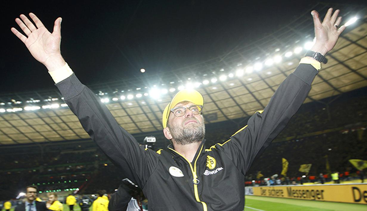 Ekspresi Juergen Klopp pelatih Borussia Dortmund saat memberikan salam perpisahan pada para suporter di Berlin, Jerman. (Reuters/Ina Fassbender)