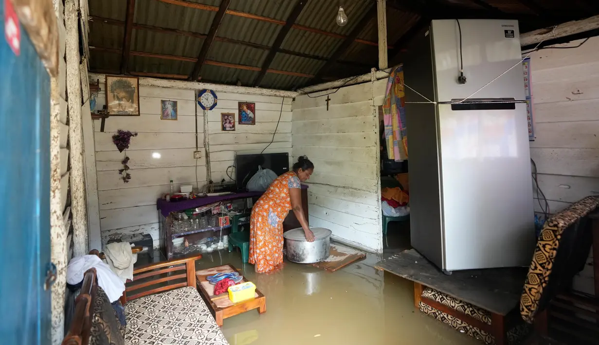 Sejumlah ahli memperingatkan bahwa negara tersebut akan menghadapi banjir yang lebih sering terjadi. (AP Photo/Eranga Jayawardena)