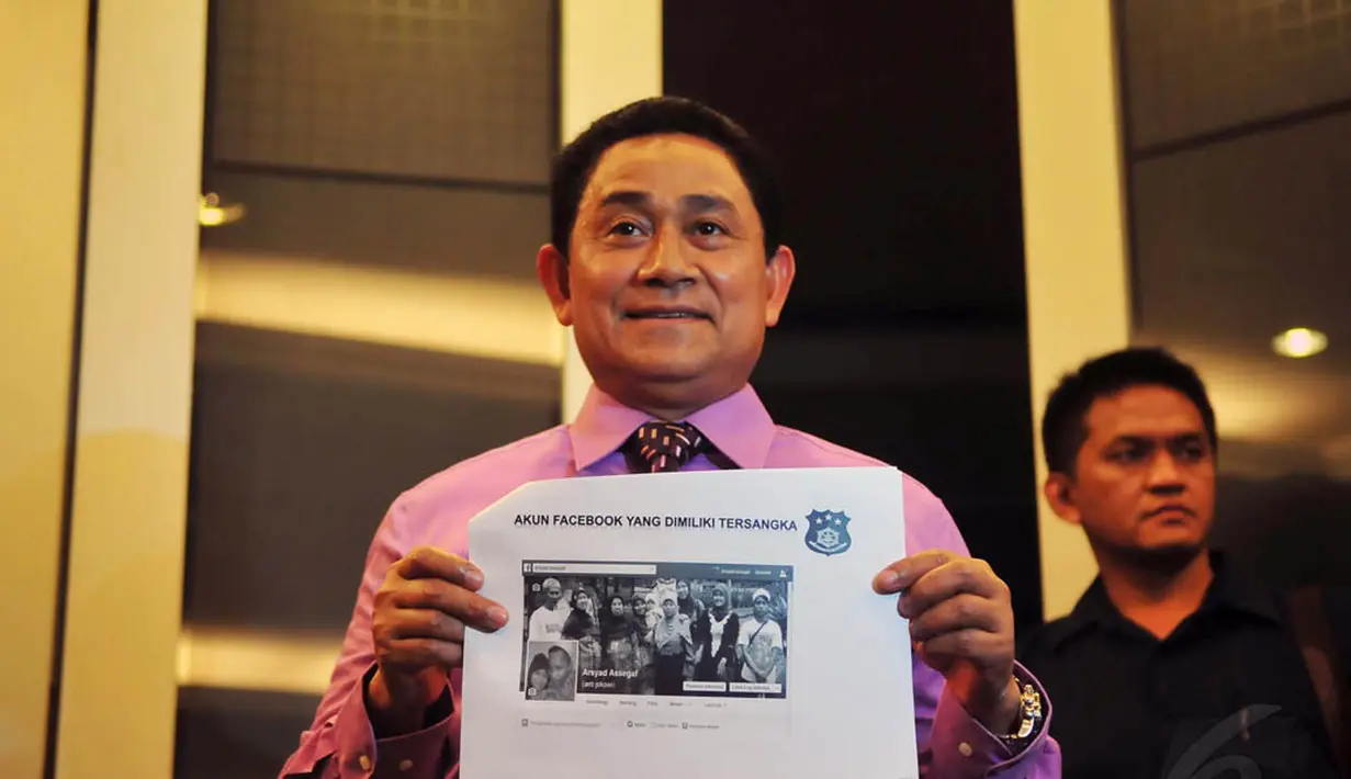 Brigjen Kamil Razak saat menggelar jumpa pers terkait kasus penghinaan terhadap Presiden Jokowi di Bareskrim Polri, Rabu (29/10/2014). (Liputan6.com/Johan Tallo)
