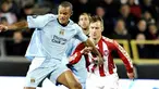 Manchester City's Vincent Kompany (L) vies with Aalborg BK's Andreas Johansson (R) during their UEFA Cup round of 16 second leg soccer match on March 19, 2009 in Aalborg, Denmark. AFP Photo / Scanpix /Henning Bagger