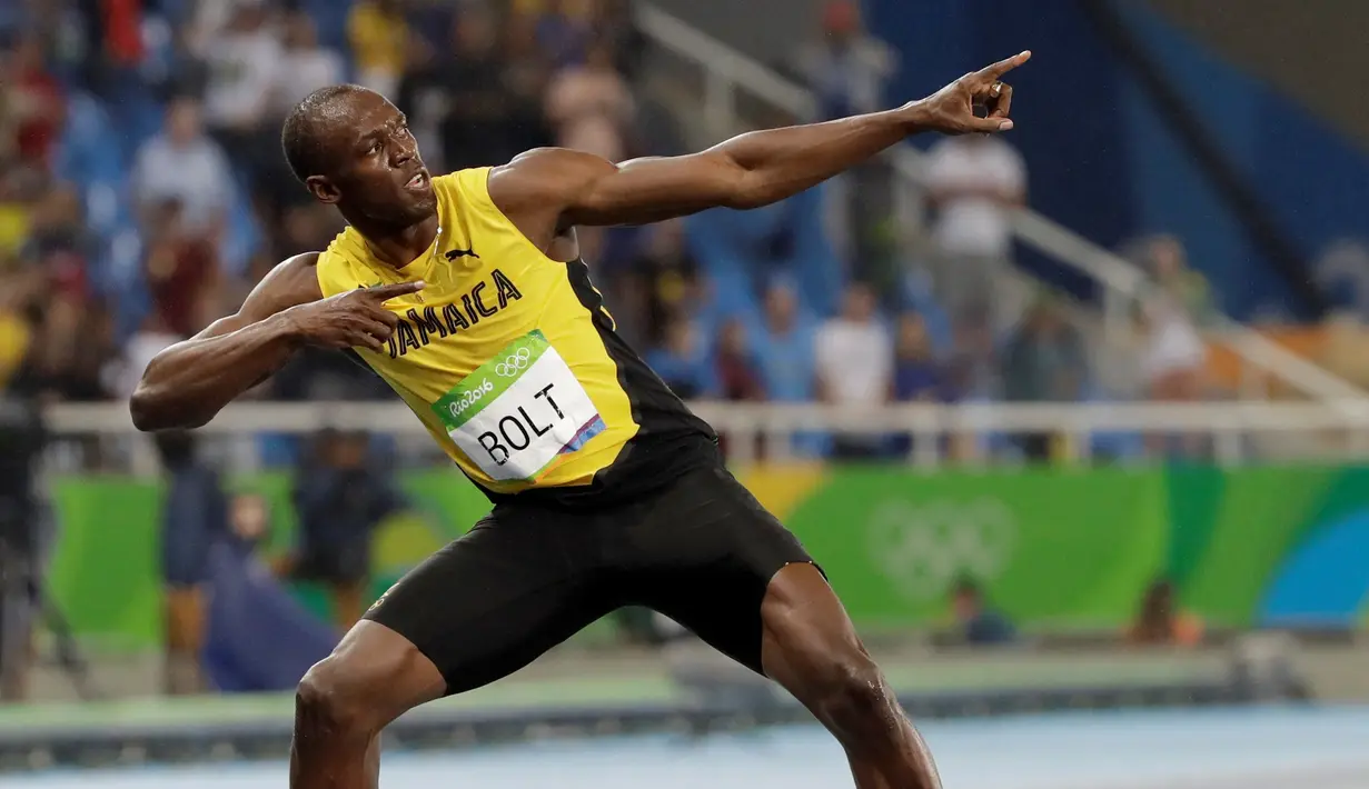 Pelari Jamaika, Usain Bolt, meraih medali emas pada nomor 200 meter Olimpiade Rio de Janiero 2016, Kamis (18/8/2016) atau Jumat pagi WIB. (AP Photo/David J. Phillip)