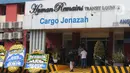 Suasana kargo jenazah saat menunggu kedatangan  Jenazah anak dari Gubernur Jawa Barat (Jabar) Ridwan Kamil, Emmeril Khan Mumtadz atau Eril di Bandara Soekarno Hatta, Tangerang, Minggu (12/6/2022). Jenazah yang bertolak dari Bern, Swiss, akan tiba sekitar pukul 15.45 WIB dengan pesawat Qatar Airways QR 95. (Liputan6.com/Angga Yuniar)