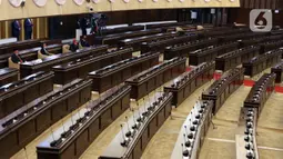 Suasana Sidang Tahunan MPR 2021 di Gedung Nusantara, Senayan, Jakarta, Senin (16/8/2021). Dalam sidang tersebut hanya sebagian angggota dewan yang hadir, sementara sisanya mengikuti sidang secara virtual. (Liputan6.com/Angga Yuniar)