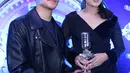Raisa dan Afgan tentunya belum merasa puas, mereka tetap menyuguhkan kolaborasi terbaik dan tak berhenti untuk menciptakan suatu nuansa karya. (Nurwahyunan/Bintang.com)