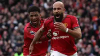 Manchester United akhirnya memecah kebuntuan pada menit ke-65 melalui gol Bryan Mbeumo. Pemain Timnas Kamerun tersebut berhasil menceploskan bola ke gawang Man City setelah sukses melalui skema serangan balik. (AFP/Darren Staples)