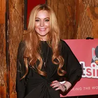 Di foto tersebut Lindsay terlihat dengan rambut berwarna merah dan mengkolase foto tersebut dengan gambar tokoh Ariel di film Disney 1989. Ia pun menyertakan sebuah tulisan bersama unggahan foto itu. (AFP/Bintang.com)