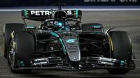Pembalap Mercedes, George Russell. (Bola.com/Dok.MOHD RASFAN / AFP).
