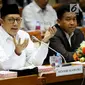 Menteri Agama Lukman Hakim Saifuddin memberi keterangan saat rapat dengan Komisi VIII DPR di Jakarta, Senin (12/3). Kenaikan harga BBM sebesar 180 persen di Arab Saudi juga mengakibatkan naiknya BPIH 2018. (Liputan6.com/JohanTallo)