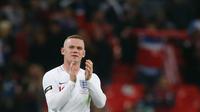 Laga perpisahan Wayne Rooney bersama timnas Inggris diakhiri dengan kemenangan manis. Bermain sejak menit ke-58 pada laga persabahatan kontra Amerika Serikat yang berlangsung di Stadion Wembley, Inggris. Timnas Inggris menang 3-0. (AFP/Ian Kington)