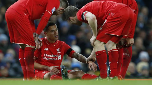 Philippe Coutinho (tengah)