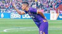 Pemain Persik, Renan Silva melakukan selebrasi usai sukses mengeksekusi penalti ke gawang Bhayangkara FC. (Gatot Susetyo/Bola.com)
