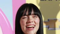 Billie Eilish, yang menyumbangkan lagu untuk soundtrack, termasuk di antara bintang yang menghadiri acara di Shrine Auditorium dan Expo Hall. (AFP/Michael Trans)