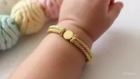 Gelang Emas Bayi/AI